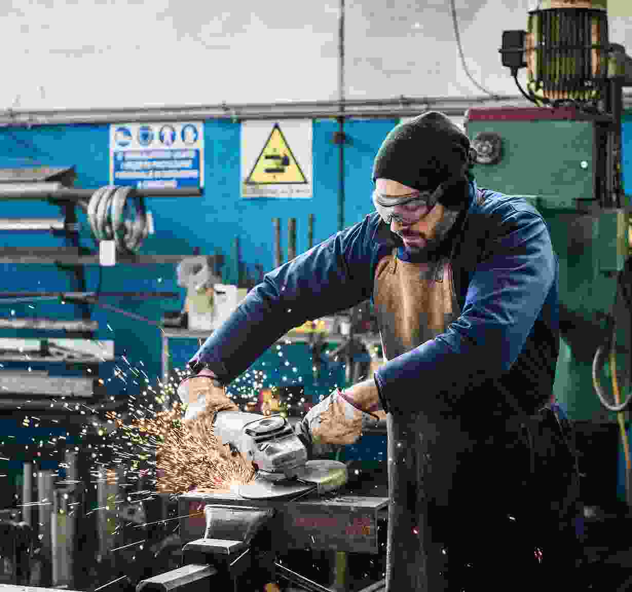 Worker with Grinder